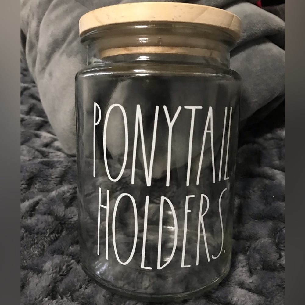 Rea Dunn Glass Jar with lid. Wording says, Ponytail Holder.